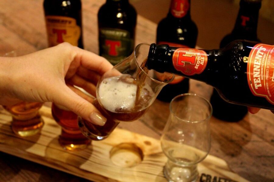 Glasgow: Beer Flight with a Haggis Taster in a Glasgow pub - Pairing Tennent’s Wellpark lager with Scottish comfort food